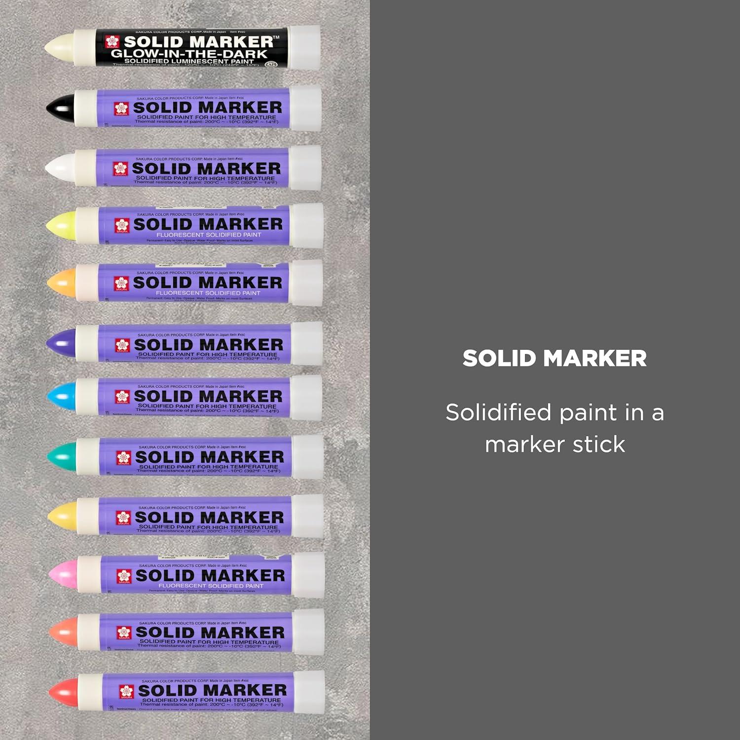 image:imageSAKURA Solid Paint Markers  11 Permanent amp 1 GlowintheDark Paint Marker Pens  For Window Wood amp Glass  Assorted Colors  12 Pack