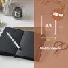 image:imageSakura A5 Sketchbook amp Gelly Roll White Bundle  Stationery Bundle for Sketching amp Creative Contrast  A5 Sketchbook with 140 GSM Paper  Opaque White Ink Pens  Black Paper  51 x 83